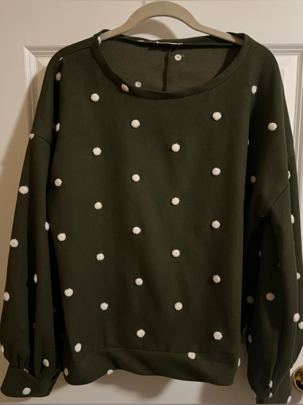 Preowned ANDTHEWHY cute army green with Pom Pom detail top. Size L